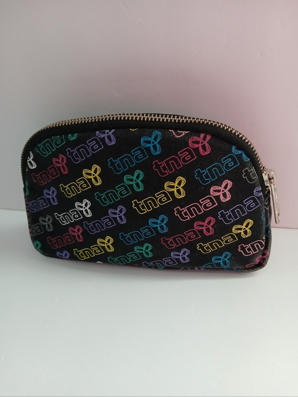 Aritzia TNA Black Cosmetic Pouch with Multicolor Logo Print_ Y2K